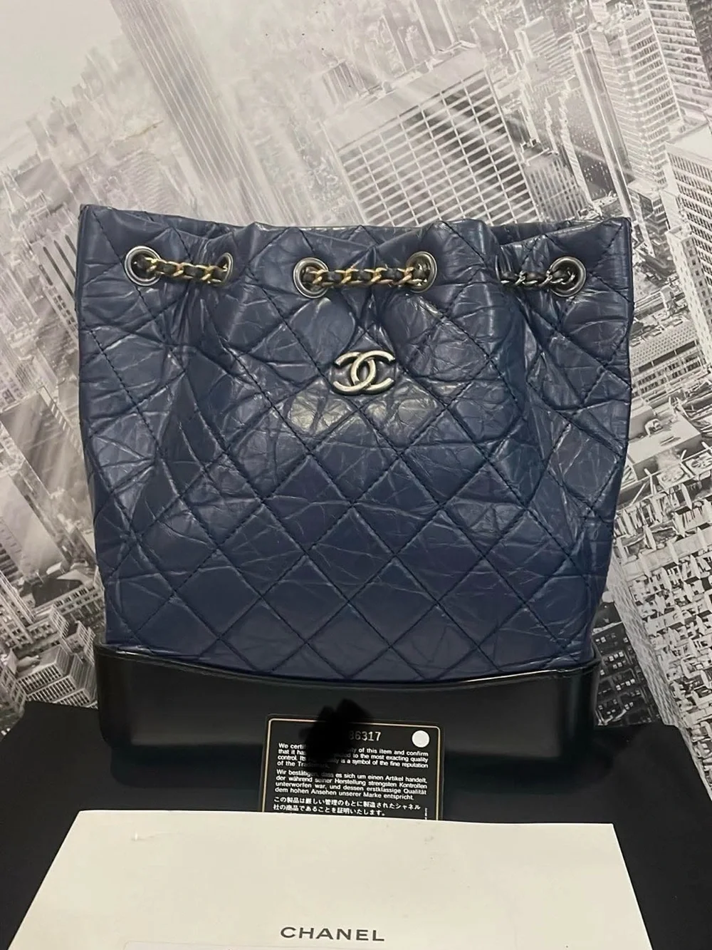 CHANEL Navy Quilted Leather Drawstring Shoulder Bag with Black Base Medium